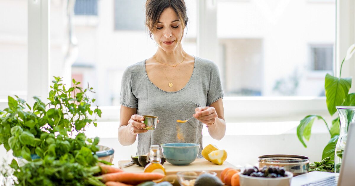 Woman-preparing-ayruvedic-food