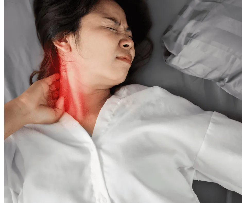 woman suffering from crick in the neck
