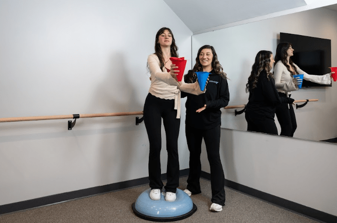 Patient performing a home exercise program after completing pelvic floor physical therapy at a wellness clinic in Philadelphia, PA